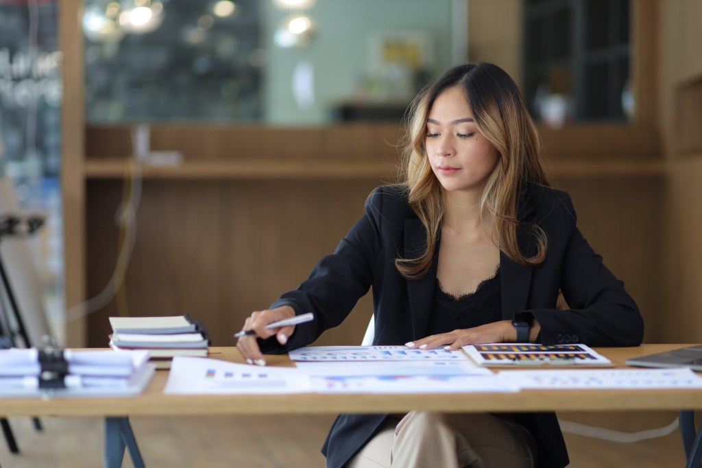 A financial advisor reviewing a home buying opportunity for a client.