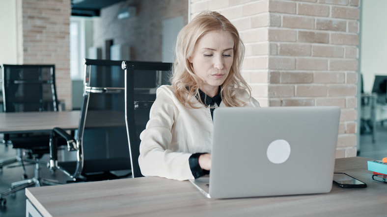 An investor reviewing her real estate investment portfolio.