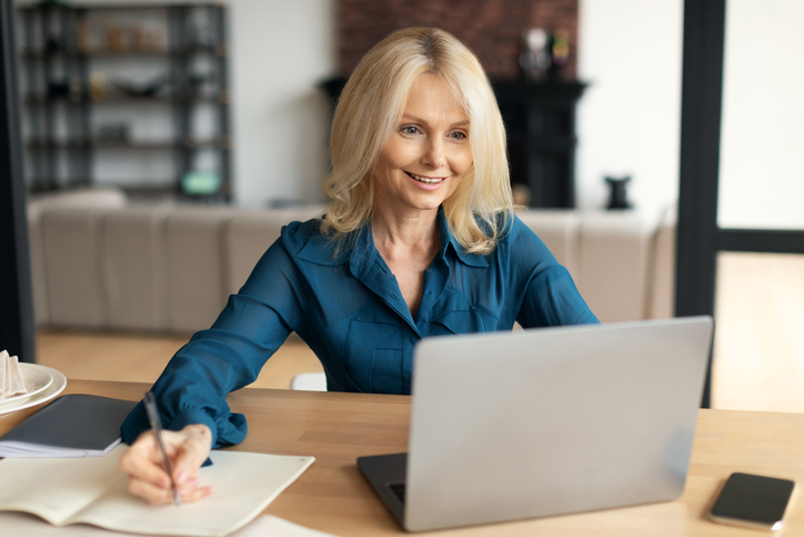 A woman deciding whether to retire at age 62 or 65.