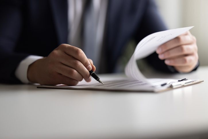 An advisor preparing for continuing education credits using financial advisor resources.