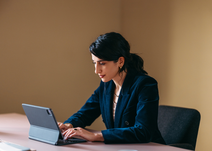 A business owner filing corporate taxes in New jersey.