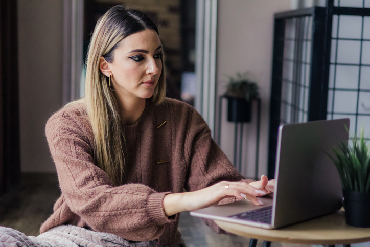 A woman researching how residual value is calculated.