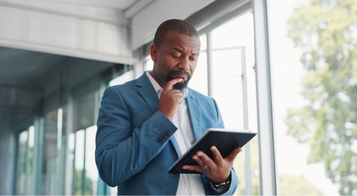 A man looking up strategies to minimize taxes on Venmo transactions.