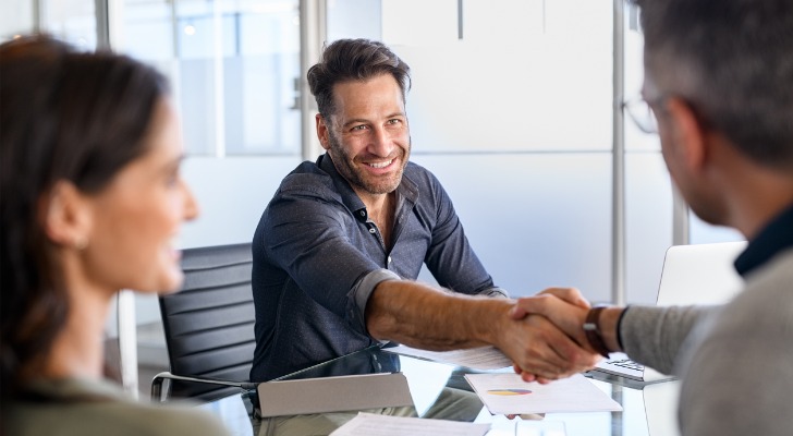 A client meeting with fiduciary advisors.