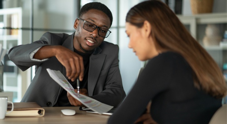 An advisor meeting with a potential client.