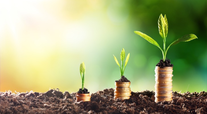 Three stacks of coins from shortest to tallest symbolizing retirement savings.