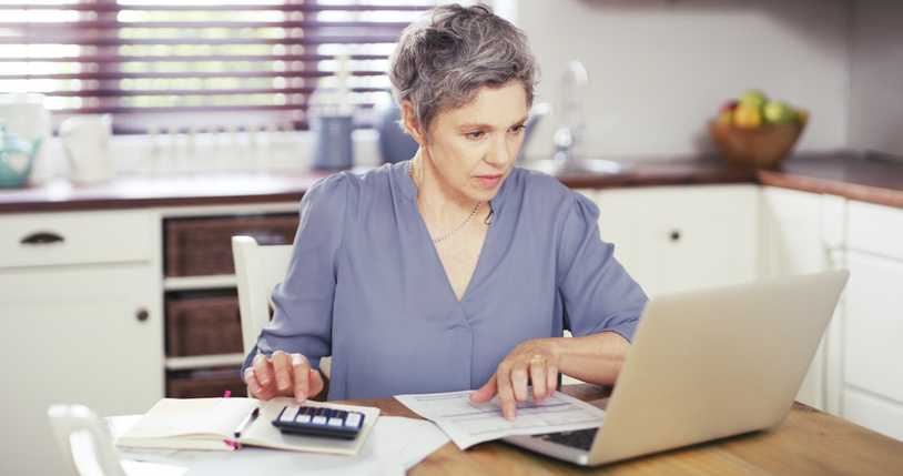 A high-net-worth investor calculating the value of an investment.