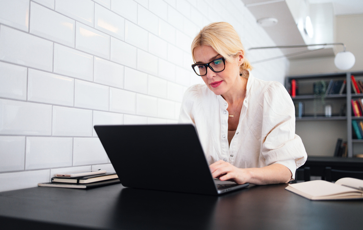 An investor reviewing her investment portfolio.