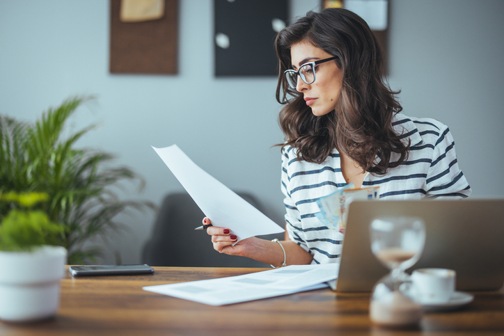 An investor reviewing her investment portfolio.