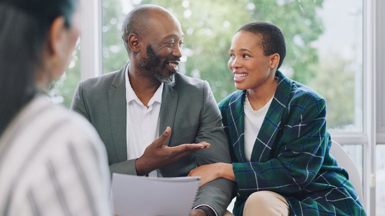 A couple meets with a financial advisor.