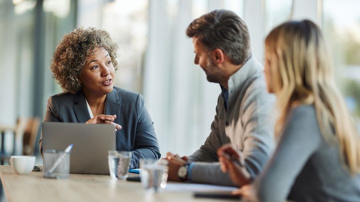 A couple meets with their financial advisor.