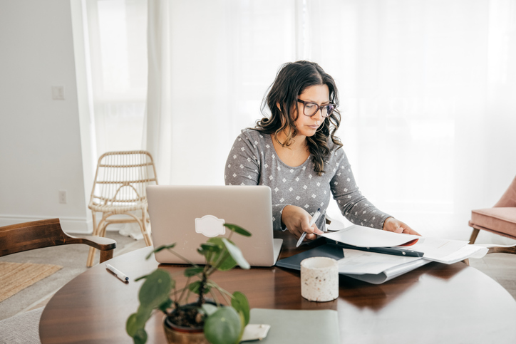 A high-net-worth investor reviewing her portfolio.
