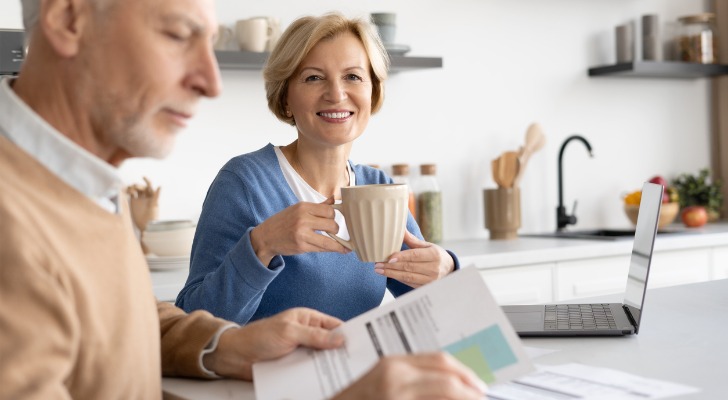 A retiree reviewing a selection of safe investments.