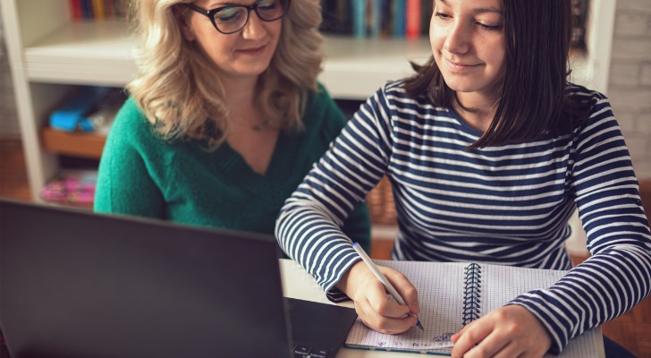 Investors comparing stock market performance.