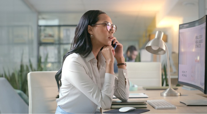 A woman looking up requirements for refundable tax credits.
