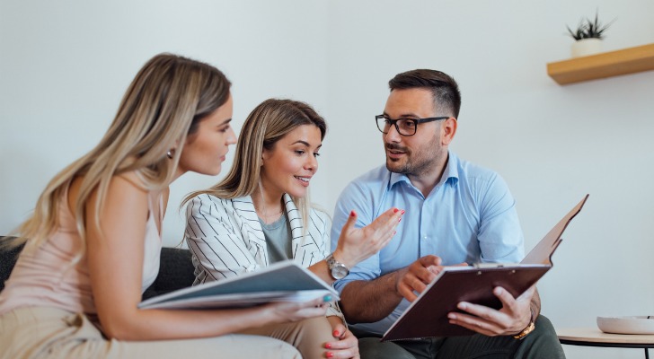 A financial advisor pointing out the differences between equities and stocks.