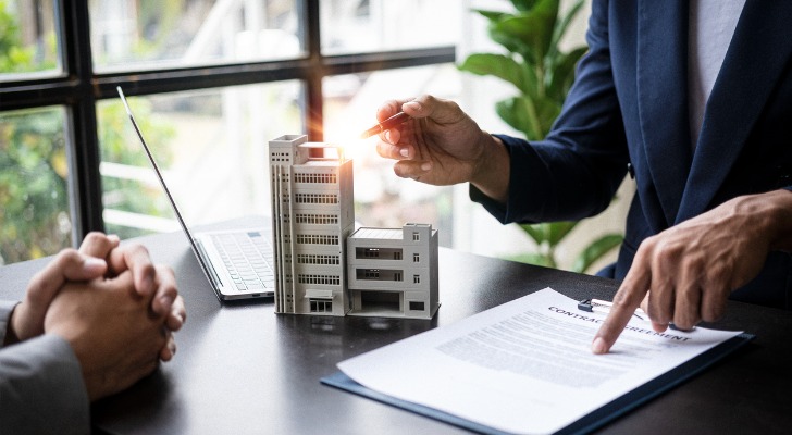 A fiduciary advisor reviewing a document for a client.