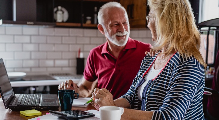A retired couple reviewing their finances.