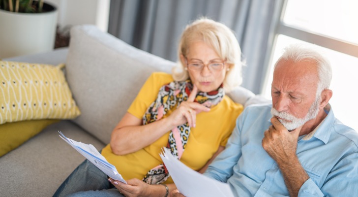 Investors comparing market returns during Trump and Biden presidencies.