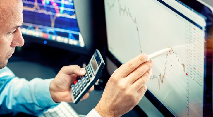 A financial advisor keeping track of a retirement portfolio.