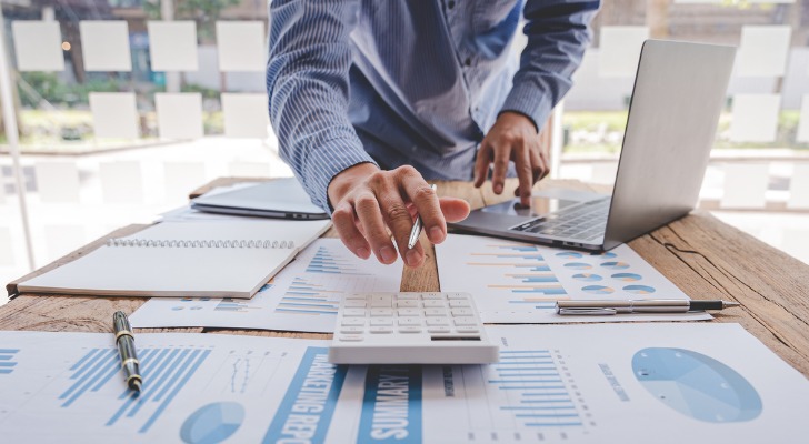 A financial advisor reviewing a portfolio.
