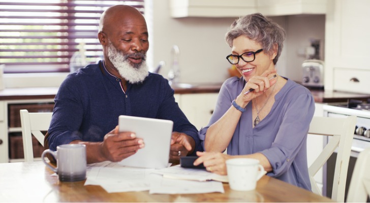 Investors comparing stock index and bond returns.