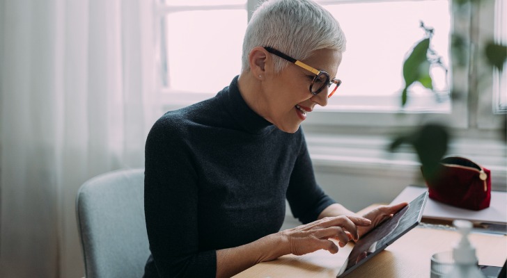 An investor checking the performance of her portfolio.