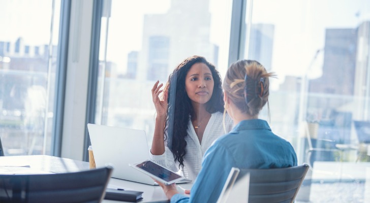 Two advisors discussing RIA in a Box for their firm.