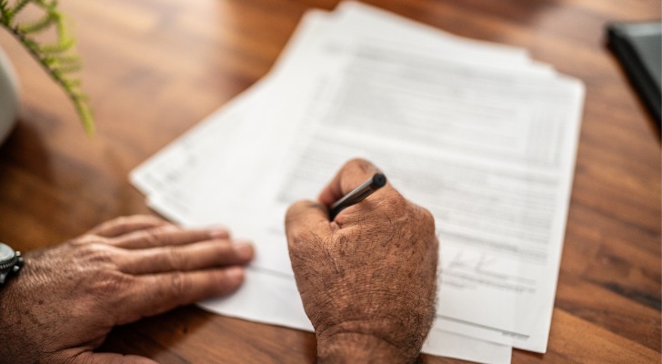 An investor reviewing the terms for an investment before signing a contract.