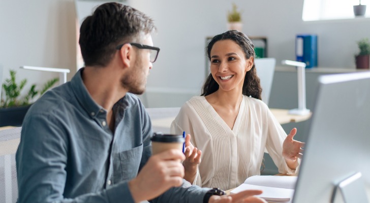 A couple discussing their investment portfolio.