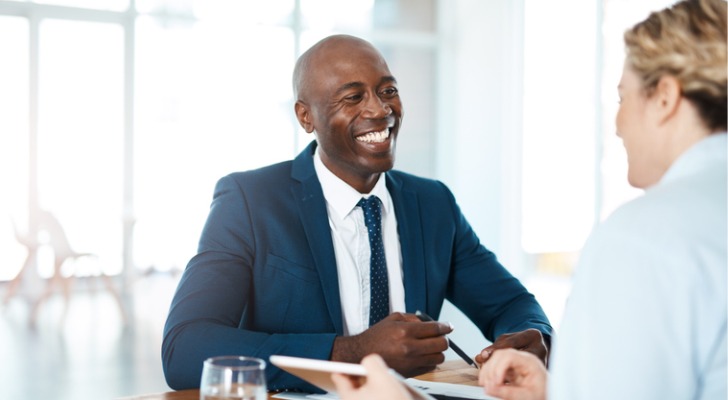 A financial advisor reviewing a portfolio with a client.