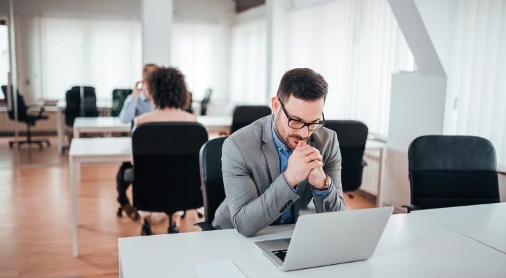 An investor reviewing the balance of stocks and bonds in his 401(k).