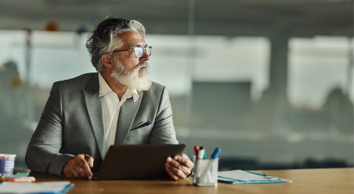 A man thinking about rolling over a 401(k) to a 403(b).