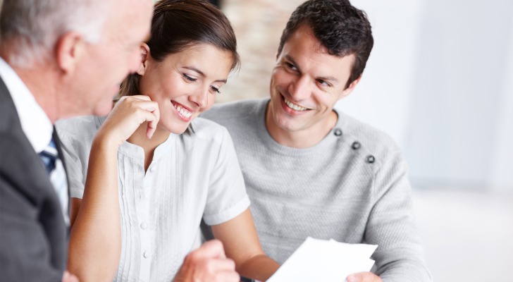 Financial advisors getting coaching tips from another advisor.