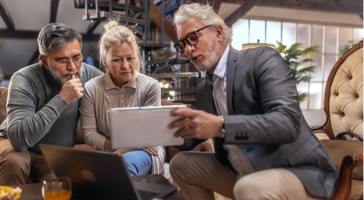 An advisor meeting with clients.