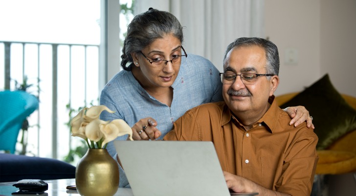 A senior couple reviewing their estate plan.