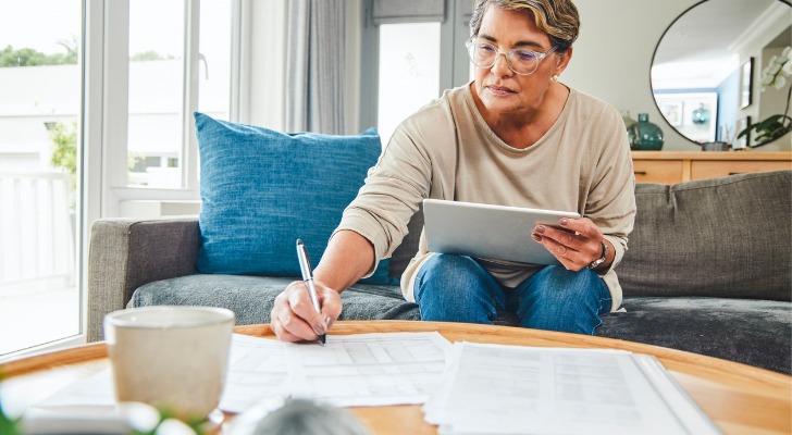An investor keeping track of her investments.