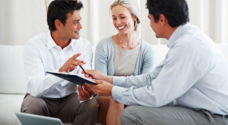 A couple meeting with a financial advisor.