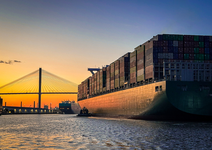 A container ship glides into Savannah, Georgia's bustling port.