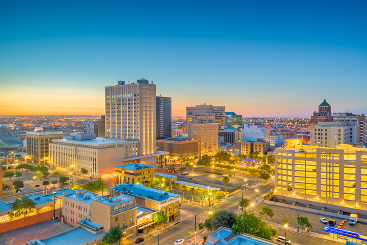 El Paso, Texas, USA downtown city skyline at dusk with Juarez, Mexico in the distance.