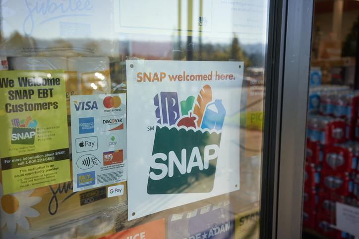 "SNAP welcomed here" sign is seen at the entrance to a Big Lots store.