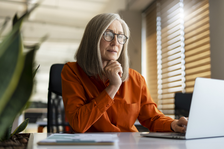 A woman looking up annuity terms.